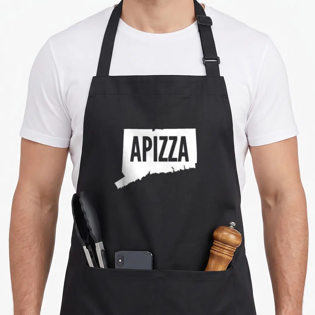 Haven connecticut apron - White Connecticut state outline with grey APizza text centered inside on grey background — shown on a black cotton canvas apron against a white background