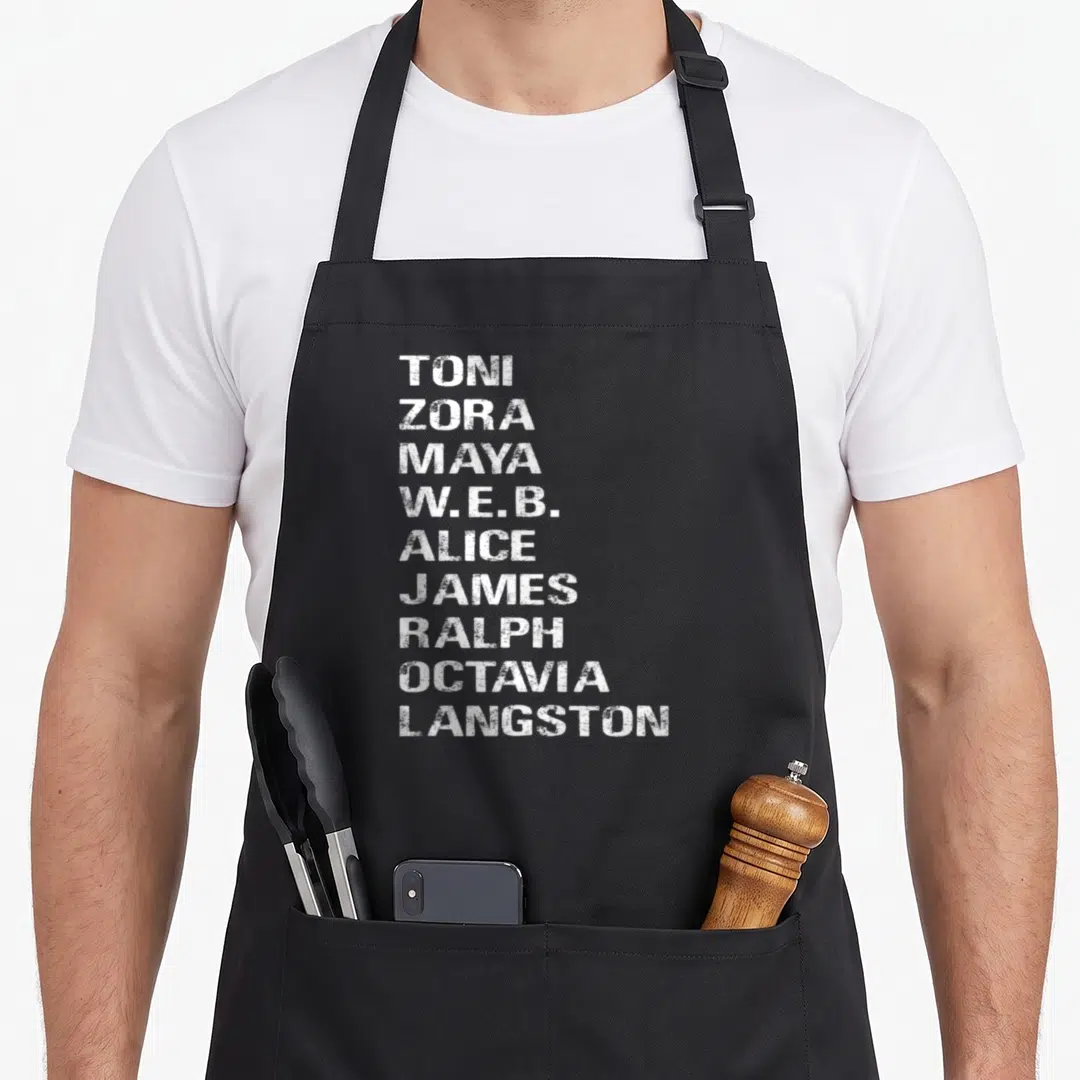 Author famous aprons - Nine lines of white stacked text listing first names of famous authors — shown on a black cotton canvas apron against a white background