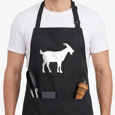Greatest goat apron for men - White goat silhouette centered on gray background, minimalist style — shown on a black cotton canvas apron against a white background