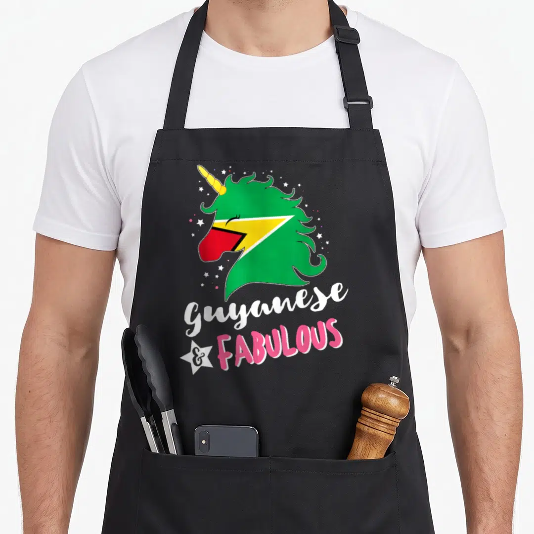 Guyananese unicorn apron - Cartoon unicorn head with Guyana flag colors and stacked white pink text reading Guyanese — shown on a black cotton canvas apron against a white background