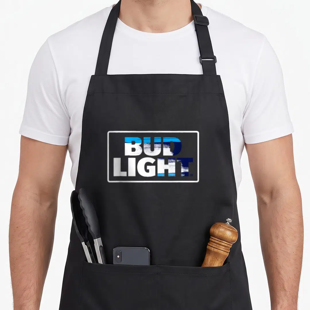 Bud logo officially apron - Blue and white BUD LIGHT text logo in a white rectangular border with brush stroke texture — shown on a black cotton canvas apron against a white background