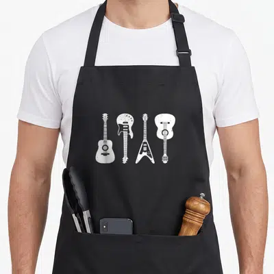 Guitar classic rock apron - Four white distressed guitar silhouettes in a horizontal row on a black background — shown on a black cotton canvas apron against a white background