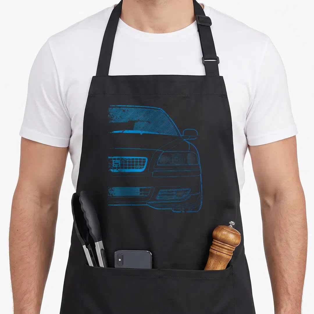 S60 racing apron - Blue distressed line art of a car front with R badge and mesh grille — shown on a black cotton canvas apron against a white background