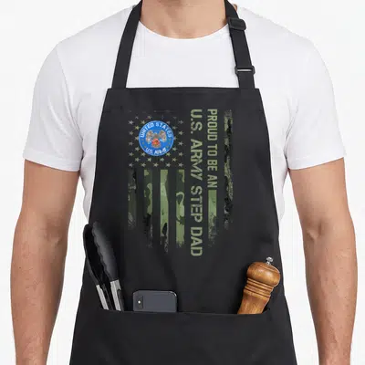 Step camo apron - US Army seal and camo stripes with vertical text PROUD TO BE AN, U.S. ARMY STEP DAD — shown on a black cotton canvas apron against a white background
