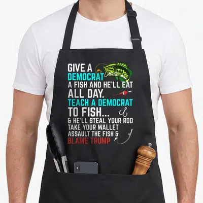 Republican fish apron - Political slogan text with green cartoon bass, red float, and fishing hook — shown on a black cotton canvas apron against a white background