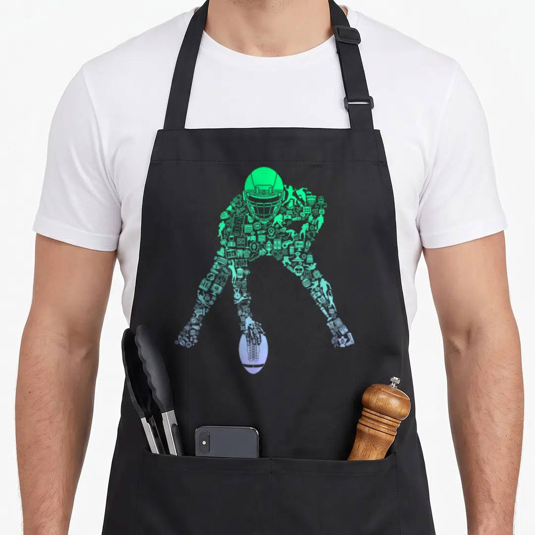 Youth football team aprons - Mosaic silhouette of football player in green and purple gradient formed by small sports — shown on a black cotton canvas apron against a white background