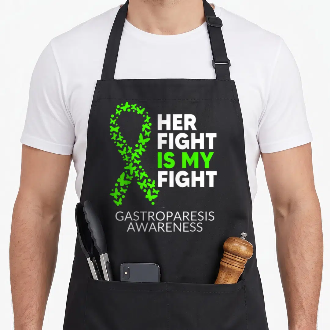 Gastroparesis awareness fight ribbon apron - Lime green butterfly ribbon and white text reading Her Fight Is My Fight — shown on a black cotton canvas apron against a white background