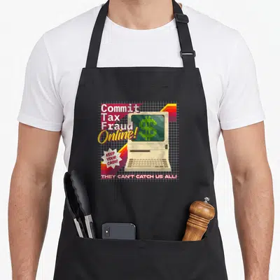 Commit video game apron - Retro beige computer with pixelated green dollar sign and sarcasm text on grid background — shown on a black cotton canvas apron against a white background