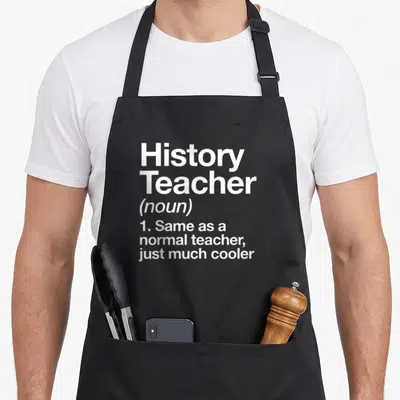 History art teacher apron - White stacked text reading History Teacher noun definition on grey background — shown on a black cotton canvas apron against a white background