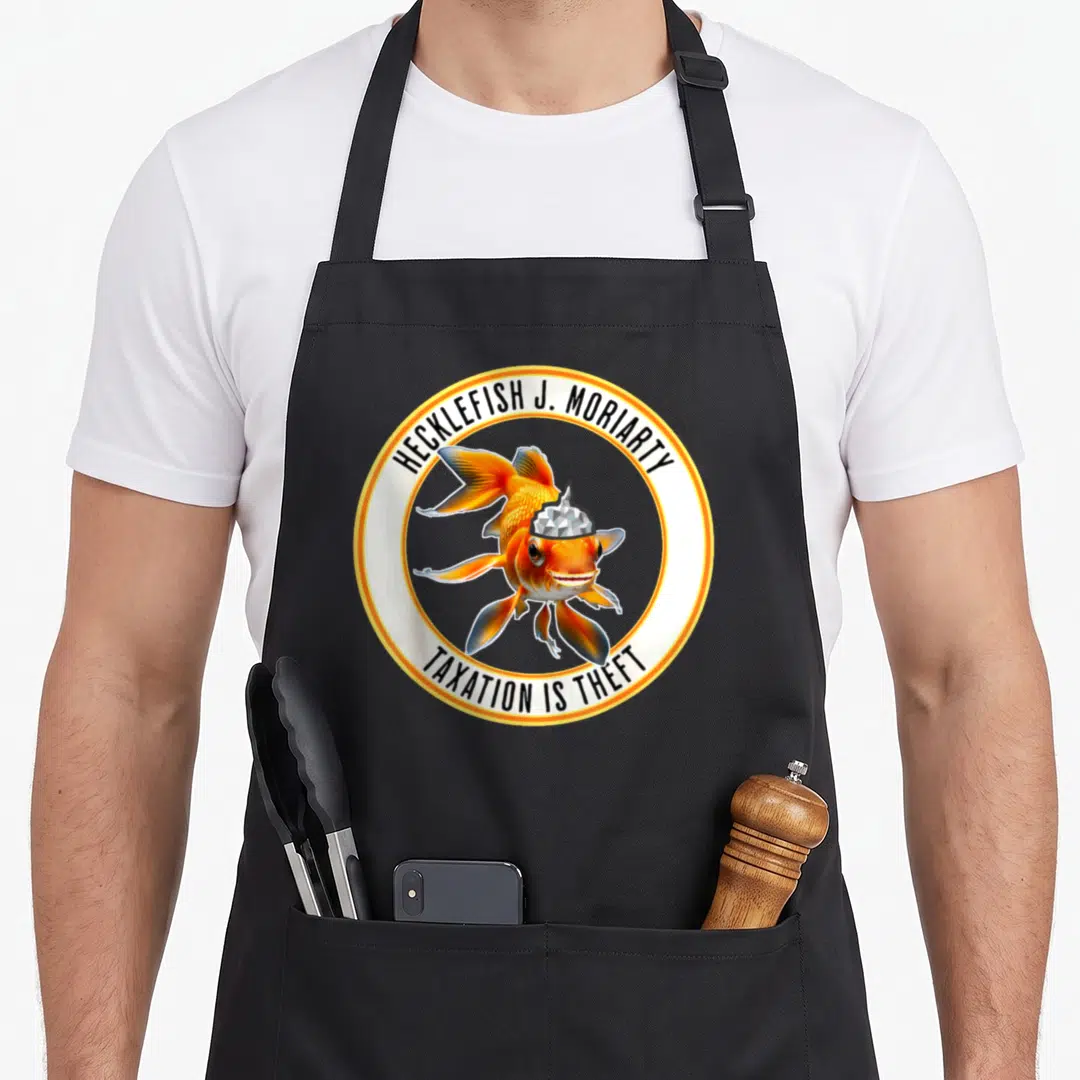 Honest politician apron - Orange fish in tinfoil hat with Hecklefish J. Moriarty and Taxation Is Theft text in circular — shown on a black cotton canvas apron against a white background