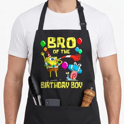 Brother theme birthday apron - SpongeBob with party hat blower Gary gift balloons BRO OF THE BIRTHDAY BOY text — shown on a black cotton canvas apron against a white background