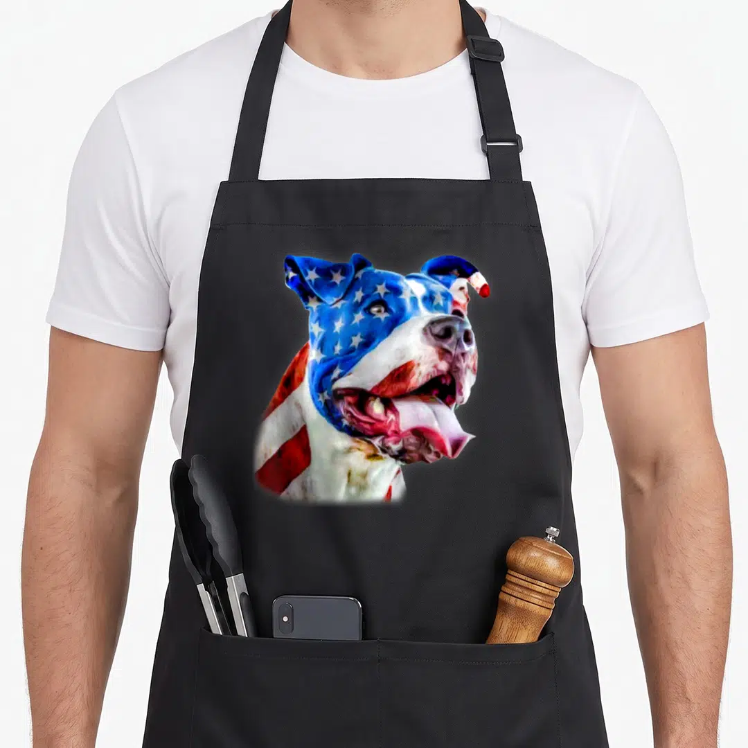 Pit dog dad apron - Watercolor pit bull head painted in blue white and red flag colors — shown on a black cotton canvas apron against a white background