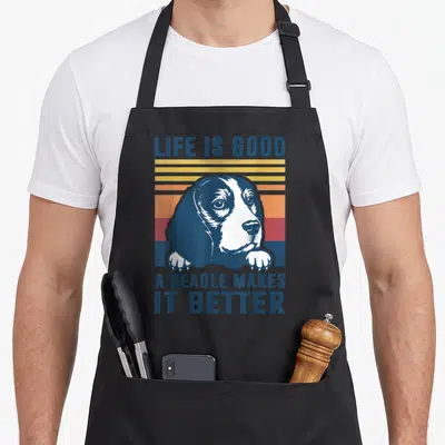 Pup beagle apron - Retro beagle head paws blue grey white yellow orange red striped sun LIFE IS GOOD A BEAGLE MAKES IT — shown on a black cotton canvas apron against a white background