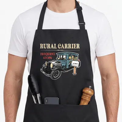 Driver postal aprons - Vintage blue mail truck with Rural Carrier Frequent Stops text and U.S. Mail mailbox — shown on a black cotton canvas apron against a white background