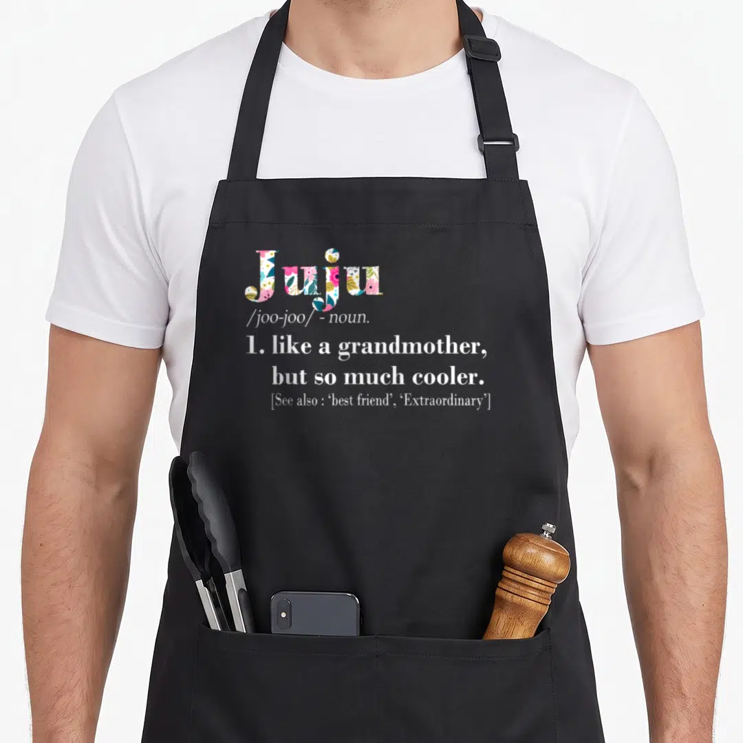 Juju grandmother apron - Floral Juju text definition reading like a grandmother but so much cooler — shown on a black cotton canvas apron against a white background