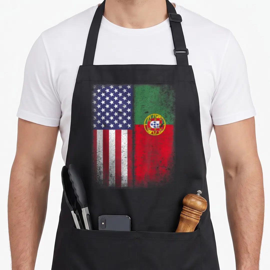 Flag portuguese apron - Two distressed flags side-by-side in red white blue green yellow — shown on a black cotton canvas apron against a white background