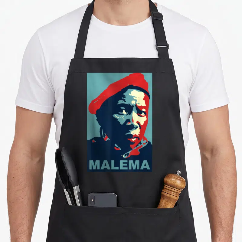 Julius south boy apron - Stylized man in red beret with dark blue shadows and MALEMA text in light blue — shown on a black cotton canvas apron against a white background