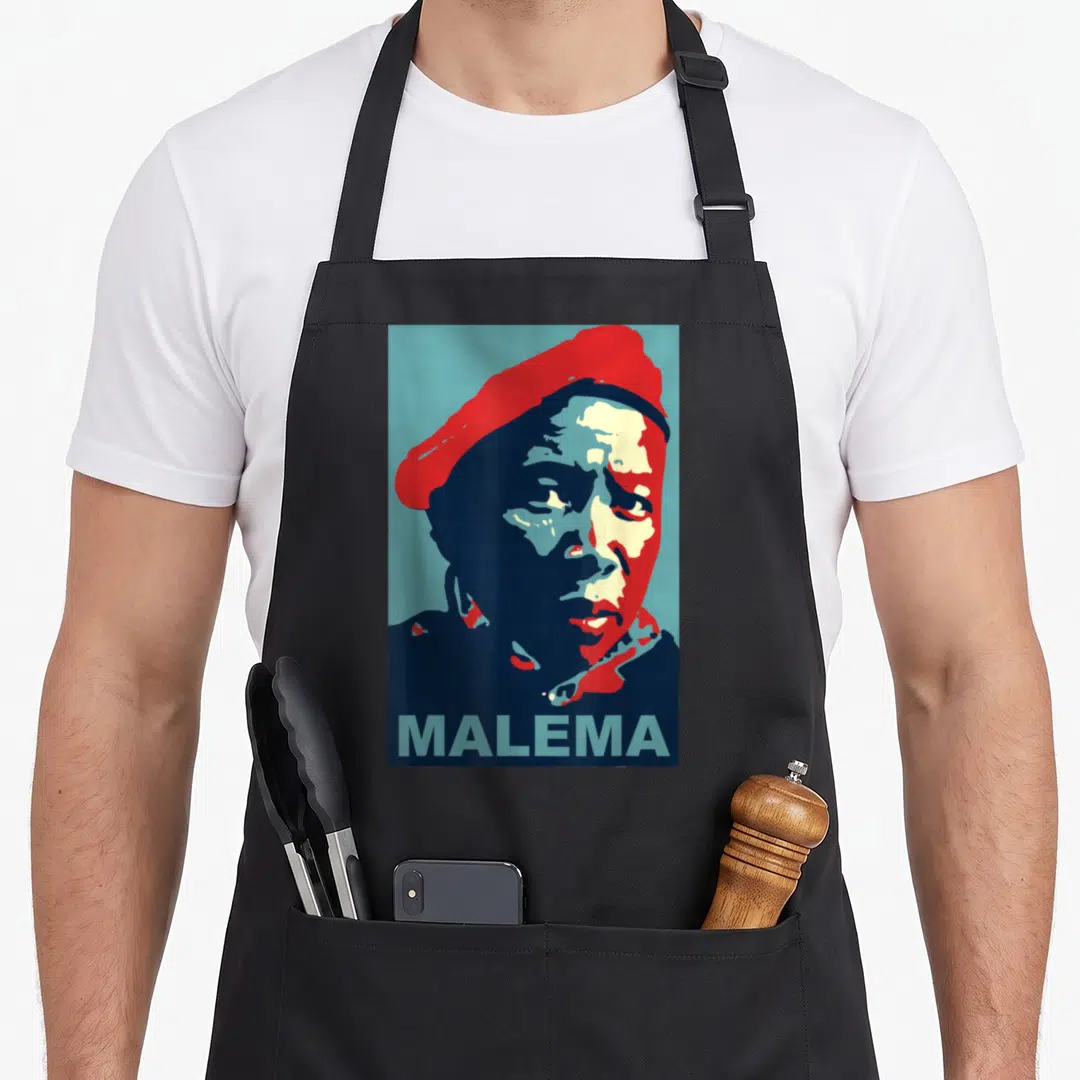 Julius south boy apron - Stylized man in red beret with dark blue shadows and MALEMA text in light blue — shown on a black cotton canvas apron against a white background