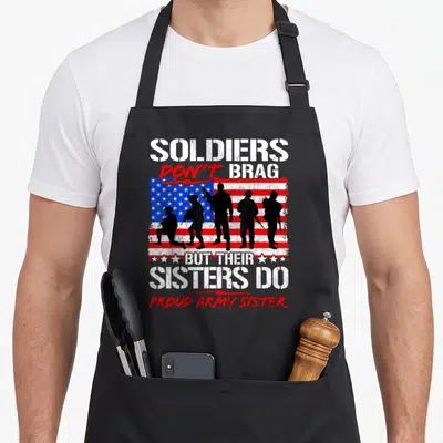 Soldier army apron - Five soldier silhouettes on distressed flag with Soldiers Don't Brag text — shown on a black cotton canvas apron against a white background