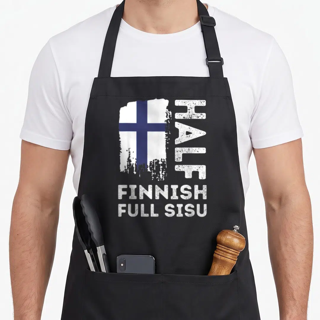 Finnish trendy apron - Distressed Finnish flag and text Half Finnish Full Sisu in white and blue — shown on a black cotton canvas apron against a white background