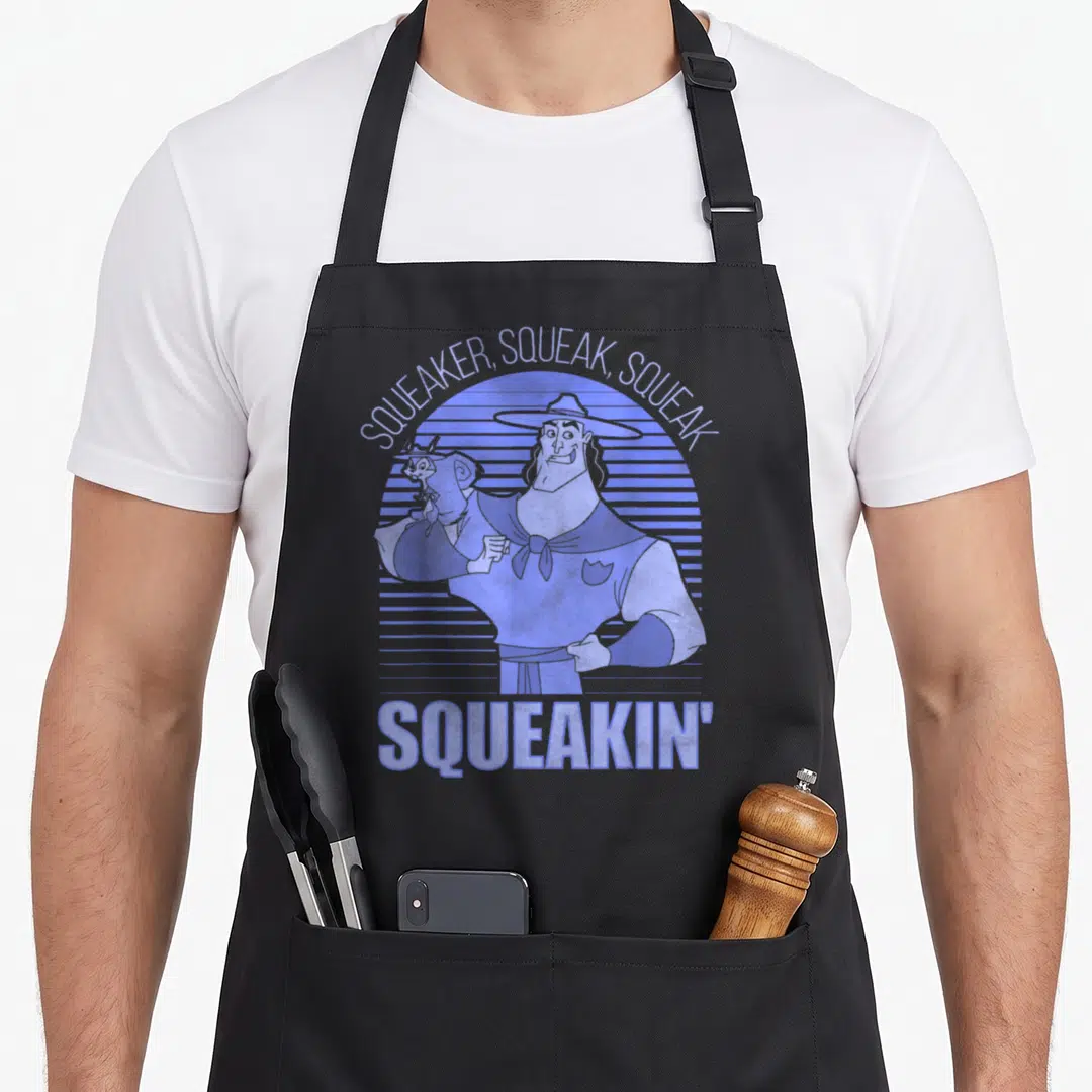 Emperor kronk apron - Man holding mouse under Squeaker Squeak Squeakin' text in retro purple striped sun design — shown on a black cotton canvas apron against a white background