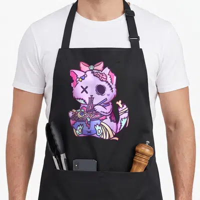 Cat anime cooking apron - Purple zombie cat with skull bow eating noodles from a blue bowl with bandaged limbs — shown on a black cotton canvas apron against a white background
