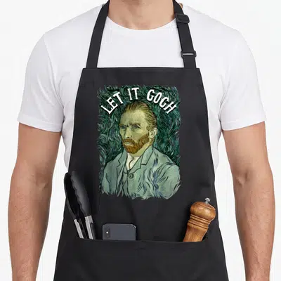 Vincent van gogh apron - LET IT GOGH text arching over a swirling green and blue portrait of Vincent van Gogh — shown on a black cotton canvas apron against a white background