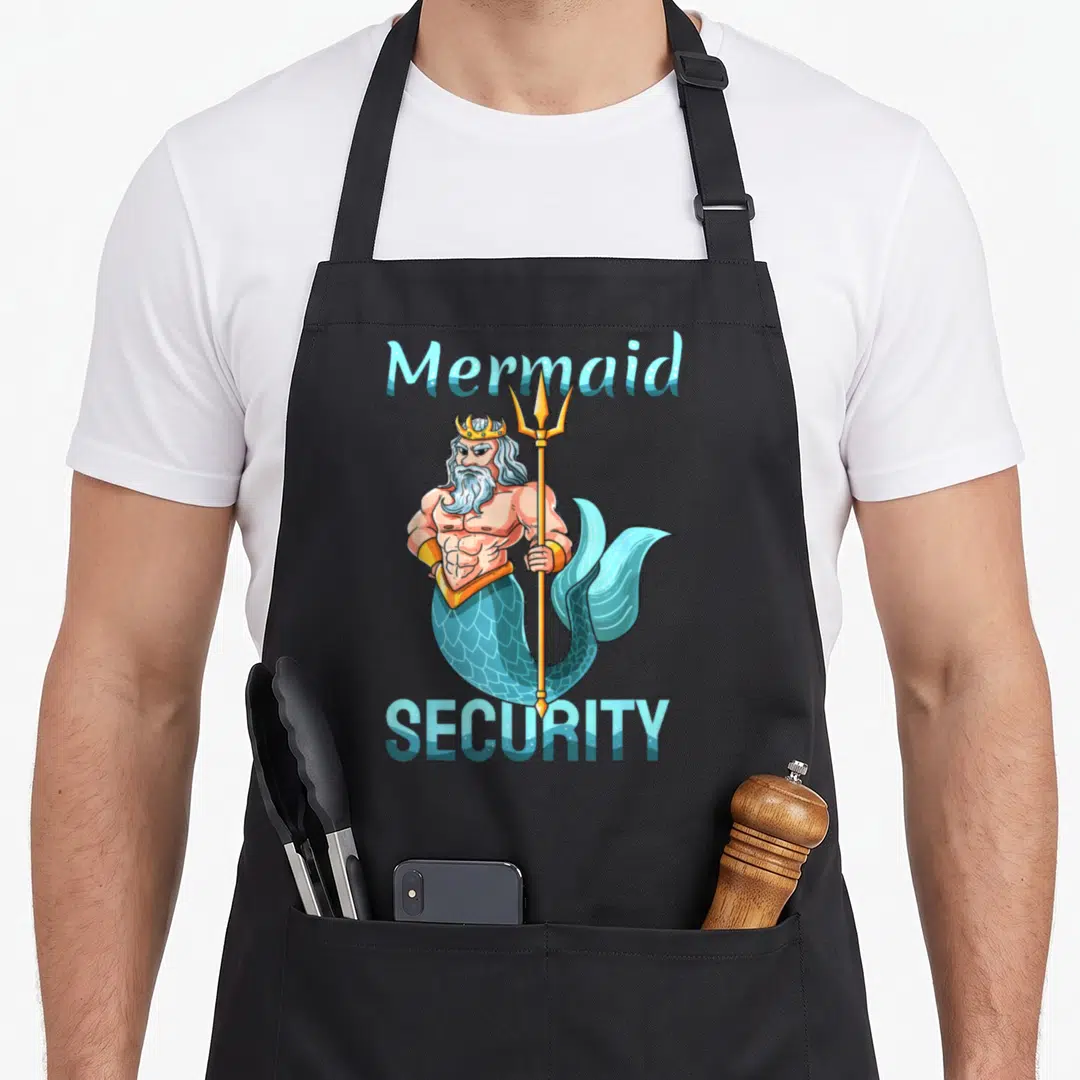 Mermaid grandpa apron - Cartoon merman holding trident with Mermaid SECURITY text in blue and yellow — shown on a black cotton canvas apron against a white background
