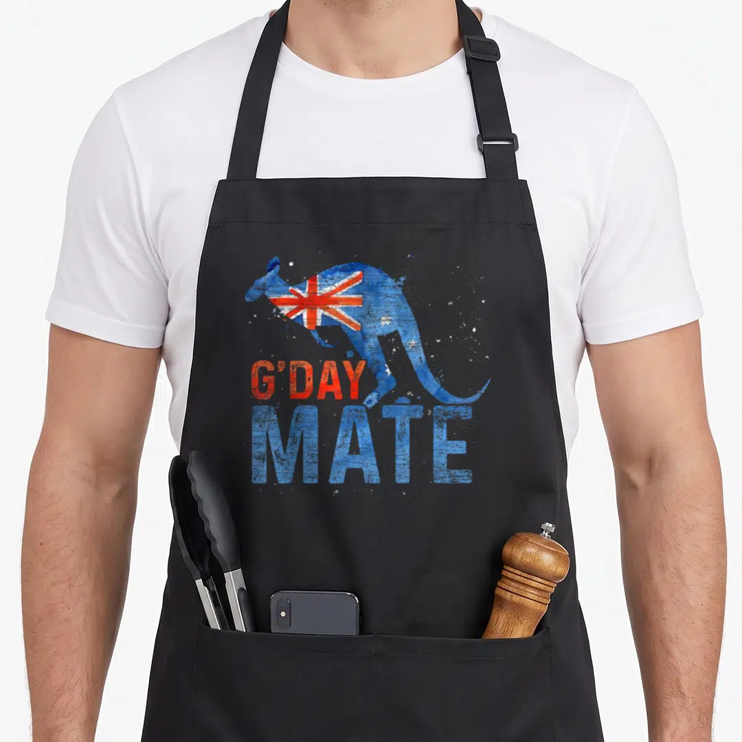 Guten kangaroo apron - Blue kangaroo filled with Australian flag above red and white G'DAY MATE text — shown on a black cotton canvas apron against a white background