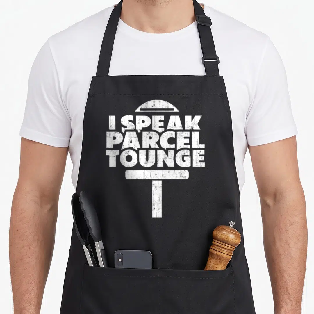 Post courier apron - White distressed sign board on post with text I SPEAK PARCEL TOUNGE — shown on a black cotton canvas apron against a white background