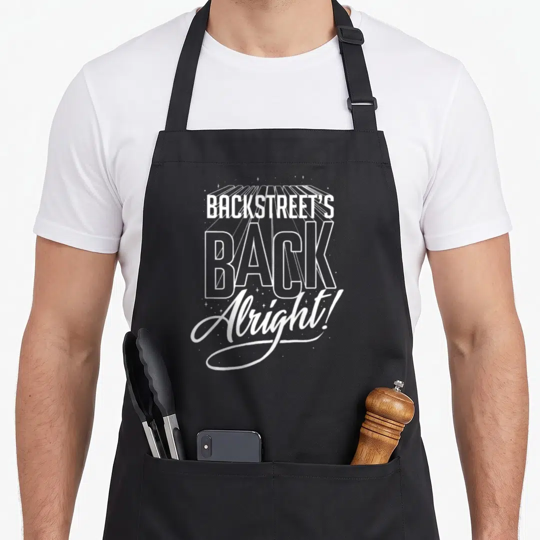 Bsb backstreet boys apron - White stacked typography reading BACKSTREET'S BACK, Alright! with 3D perspective lines — shown on a black cotton canvas apron against a white background