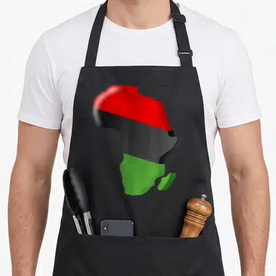 Flag african apron - Map of Africa filled with three horizontal stripes of red, black, and green — shown on a black cotton canvas apron against a white background