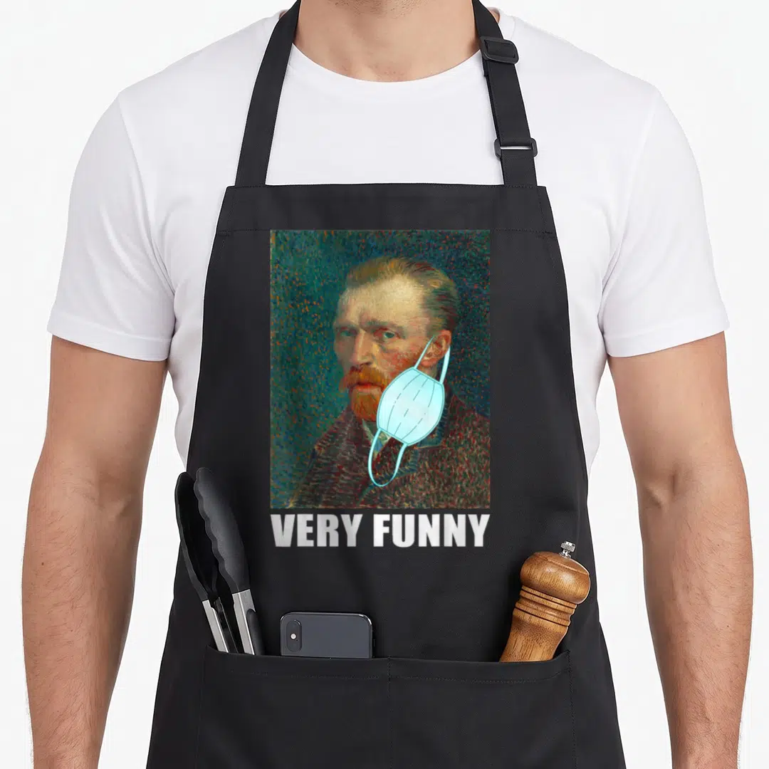 Face van gogh apron - Portrait of a man with a blue mask hanging off one ear above white text reading VERY FUNNY — shown on a black cotton canvas apron against a white background