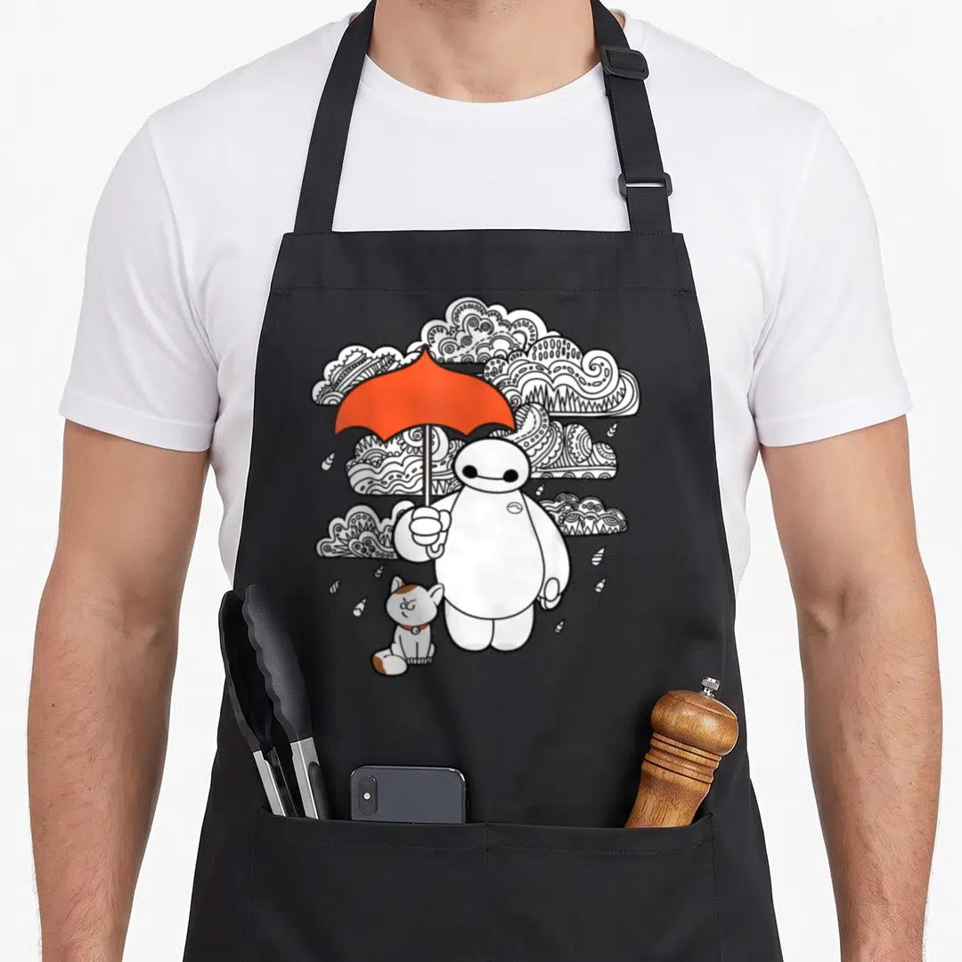 Hero patterned apron - White character holding red umbrella with intricate black clouds and small cat — shown on a black cotton canvas apron against a white background