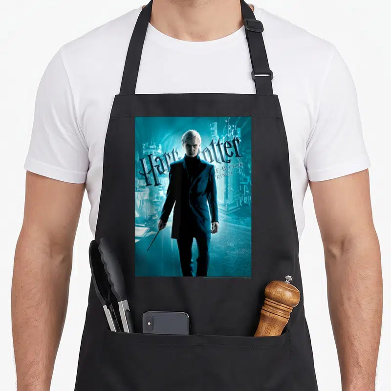 Prince blood apron - Man in suit holding wand with Harry Potter Half-Blood Prince text on blue background — shown on a black cotton canvas apron against a white background