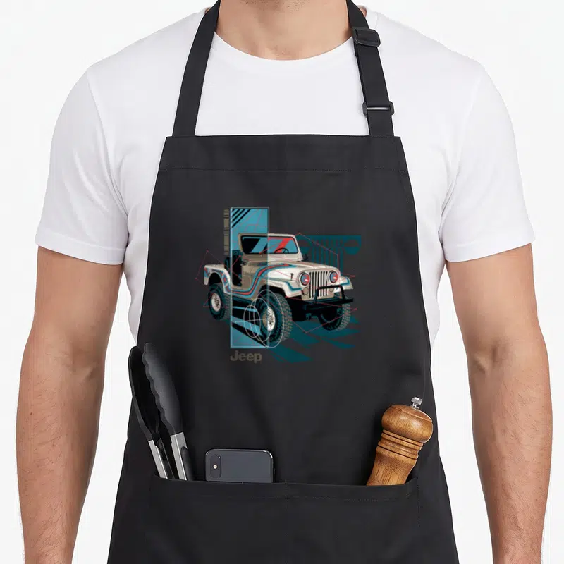 Painted wrangler apron - White retro Jeep illustration with teal shapes and red geometric lines — shown on a black cotton canvas apron against a white background