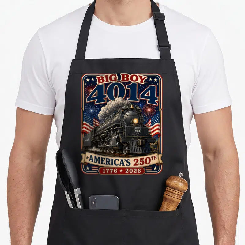 Train 4th of july apron - Big Boy 4014 steam locomotive with US flags and America 250th text in retro style — shown on a black cotton canvas apron against a white background
