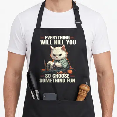 D20 gaming apron - Cartoon cat holding d20 die with knife and coins under sarcastic text — shown on a black cotton canvas apron against a white background