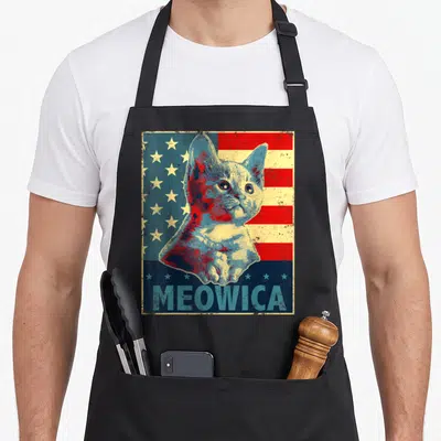 Cat patriotic 4th of july apron - Retro cat portrait over red blue yellow stripes with MEOWICA text at bottom — shown on a black cotton canvas apron against a white background