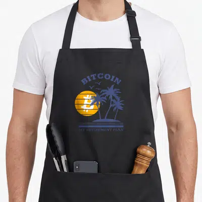 Bitcoin retirement apron - Retro sunset with striped sun, btc symbol, palm trees, and birds in purple orange white — shown on a black cotton canvas apron against a white background