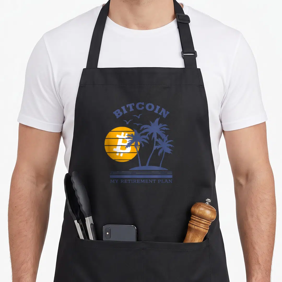 Bitcoin retirement apron - Retro sunset with striped sun, btc symbol, palm trees, and birds in purple orange white — shown on a black cotton canvas apron against a white background