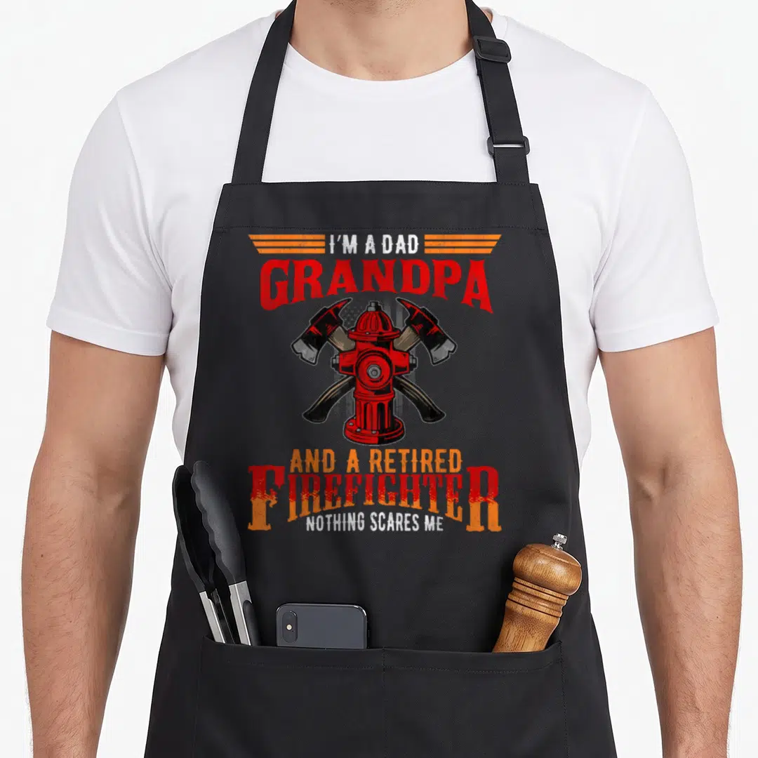 Grandpa firefighter aprons - Distressed fire hydrant with crossed axes and text I'm a Dad Grandpa Retired Firefighter — shown on a black cotton canvas apron against a white background