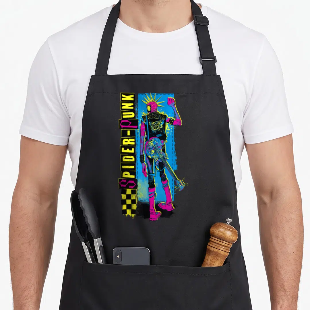 Across parts of an apron - Vertical SPIDER-PUNK text next to a punk character with guitar on blue background — shown on a black cotton canvas apron against a white background