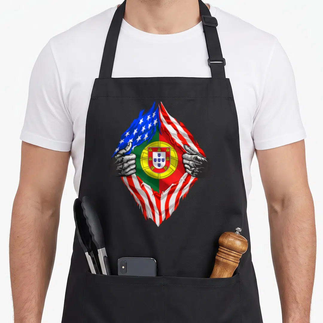 Portugal flag portuguese apron - Two hands tearing combined US and Portugal flag showing red white blue green yellow — shown on a black cotton canvas apron against a white background
