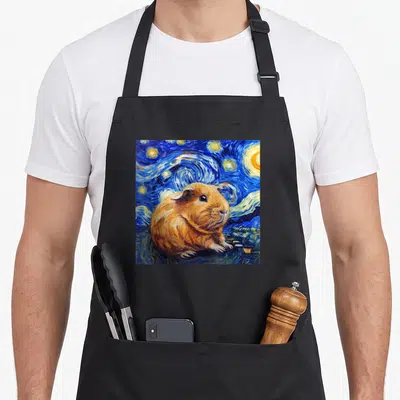 Guinea van gogh apron - Orange guinea pig watercolor painting against swirling blue sky and yellow stars — shown on a black cotton canvas apron against a white background