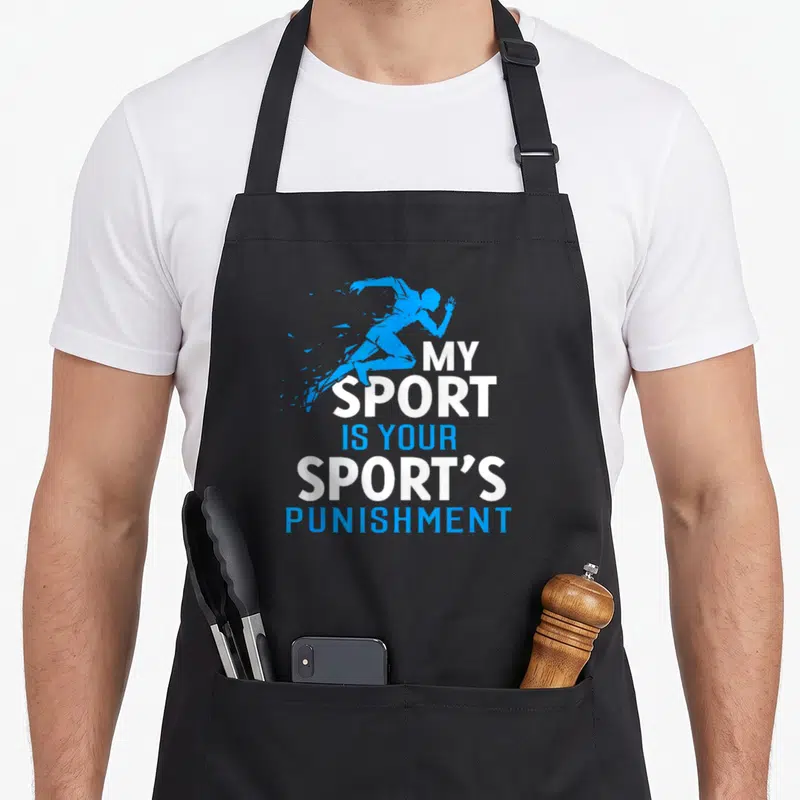 Punishment funny athletic apron - Blue runner silhouette above white and blue text reading MY SPORT IS YOUR SPORTS — shown on a black cotton canvas apron against a white background