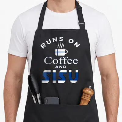 Sisu coffee apron - White cup with blue Finnish flag and text Runs on Coffee And Sisu — shown on a black cotton canvas apron against a white background