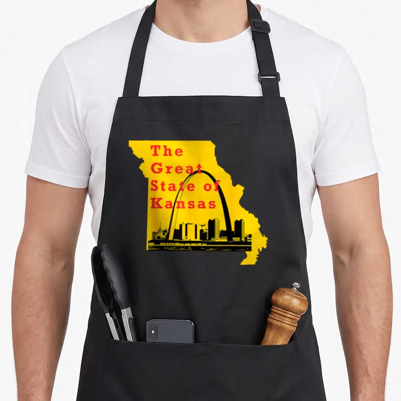 State missouri river apron - Yellow Missouri map with red The Great State of Kansas text and black Gateway Arch — shown on a black cotton canvas apron against a white background