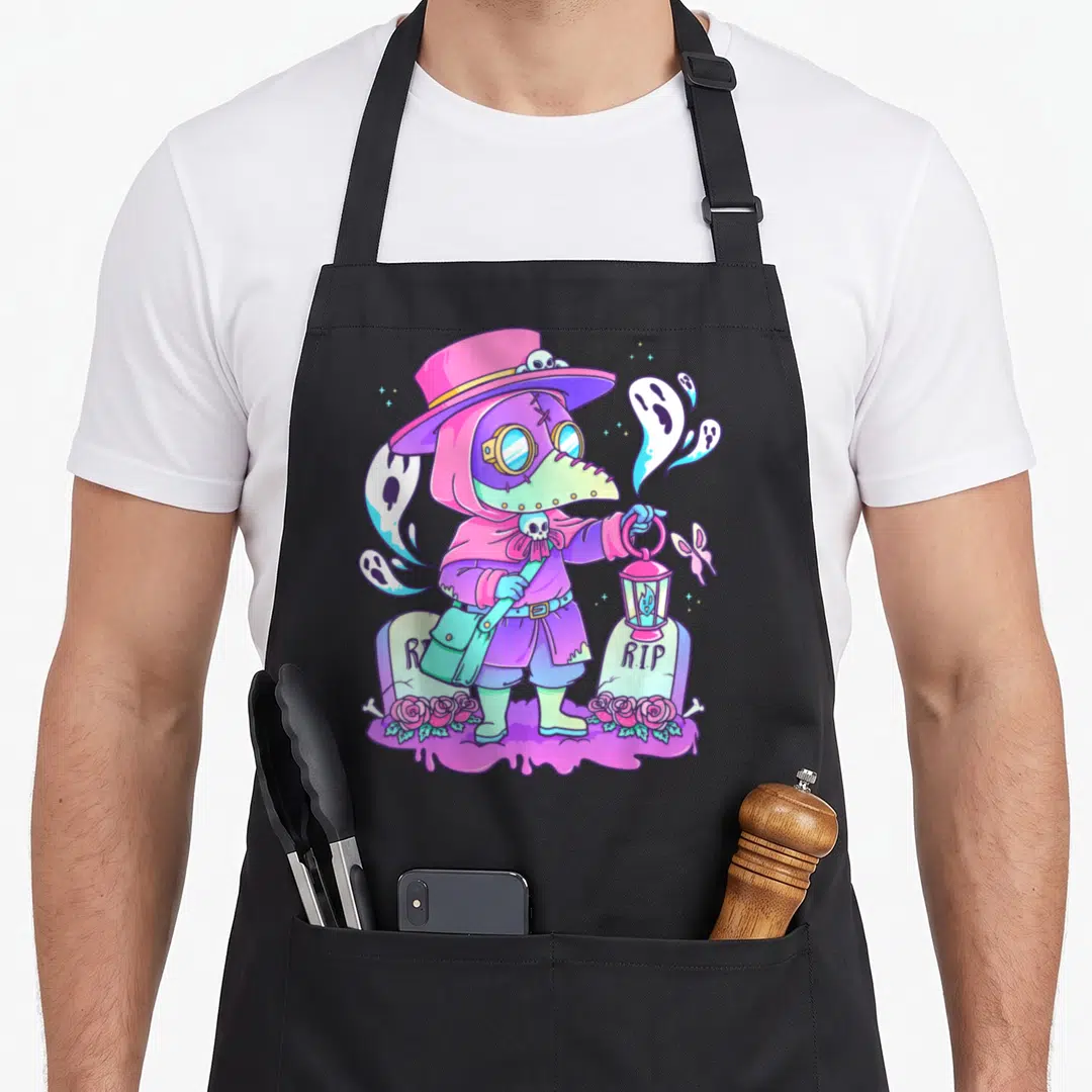 Doctor goth apron - Pastel plague doctor holding lantern between tombstones marked RIP with floating ghosts — shown on a black cotton canvas apron against a white background