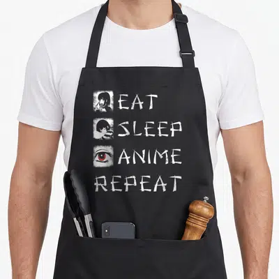 Sleep repeat anime apron - Stacked EAT SLEEP ANIME REPEAT text with girl eating, sleeping, and red eye illustrations — shown on a black cotton canvas apron against a white background